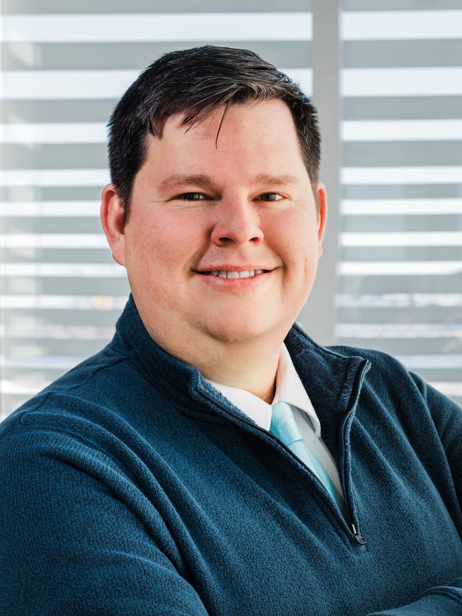 Portrait image of Hank Muzney